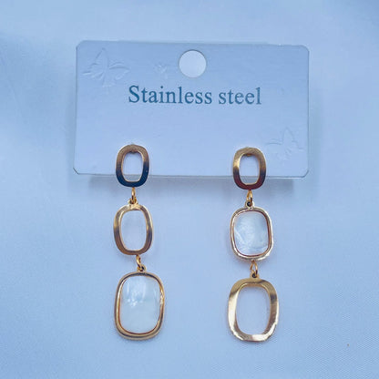 Gold Earrings With Oval Shapes