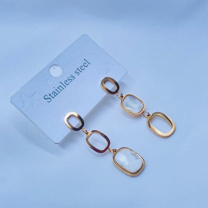 Gold Earrings With Oval Shapes